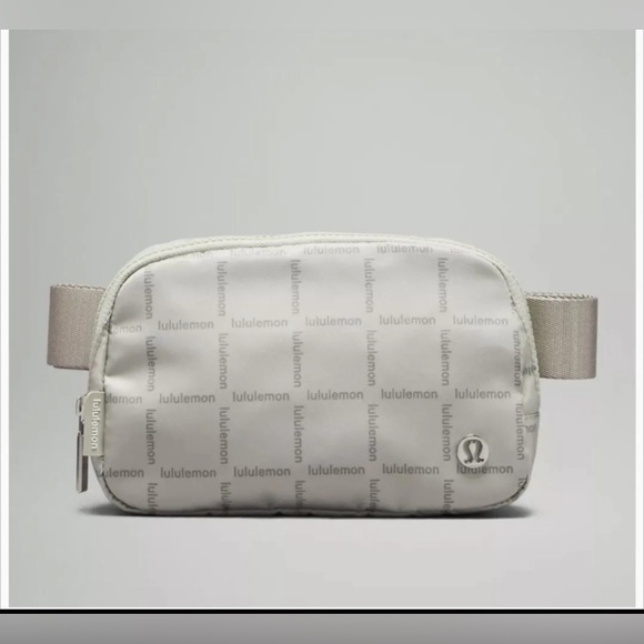 lululemon athletica Handbags - NWT *SOLD OUT Lululemon Everywhere Belt Bag 1L Wordmark Grid Mini Raw Linen